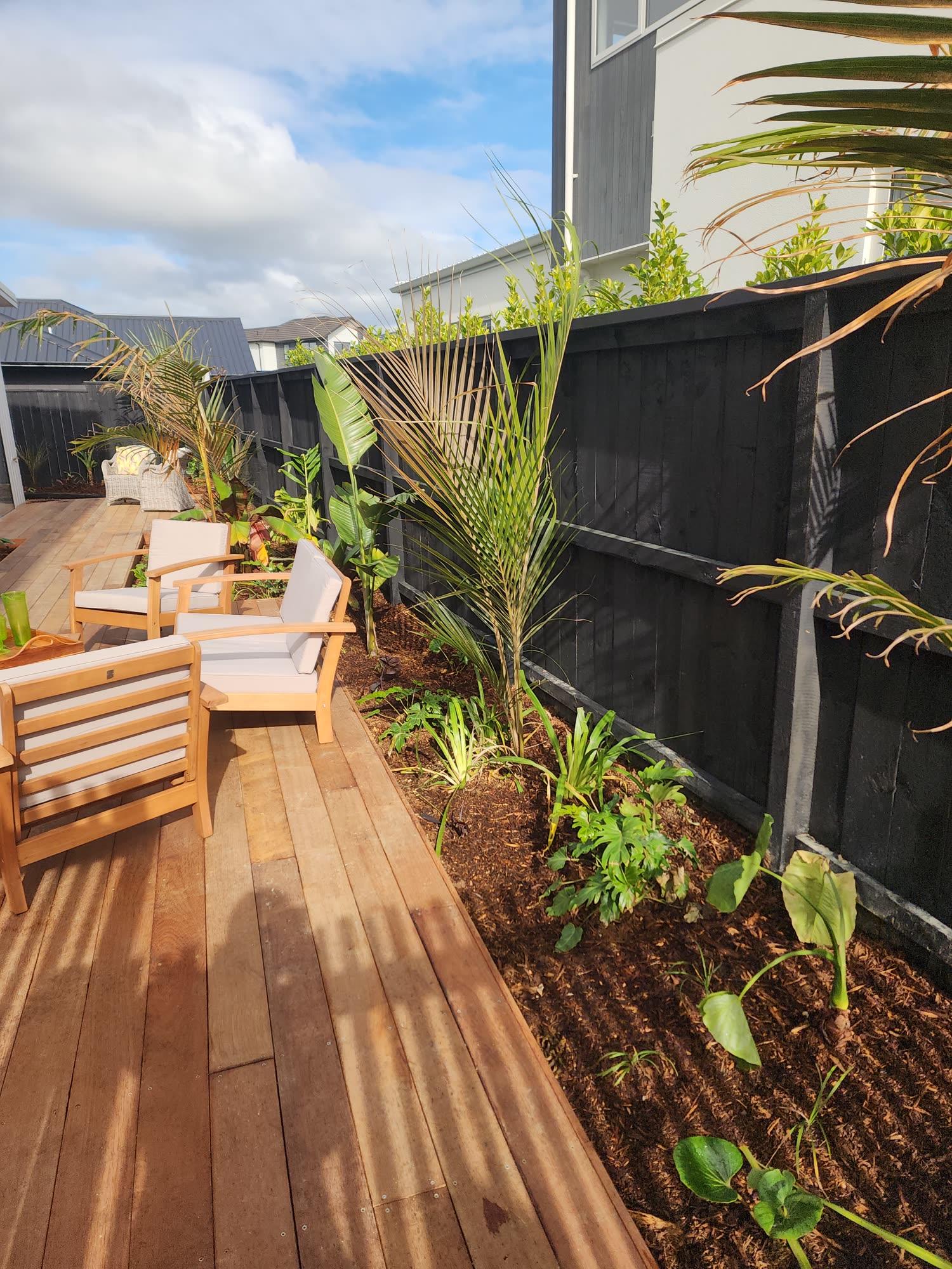 Narrow side garden boardwalk and planting: decking photo 10